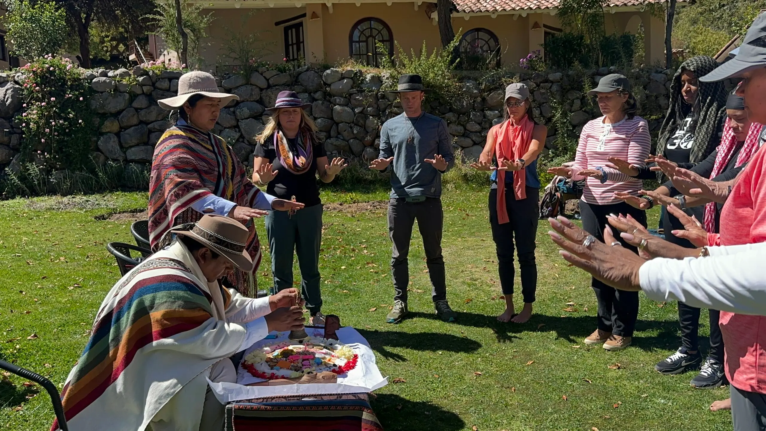A group of people enjoying a cultural event in Chinchero, Cusco